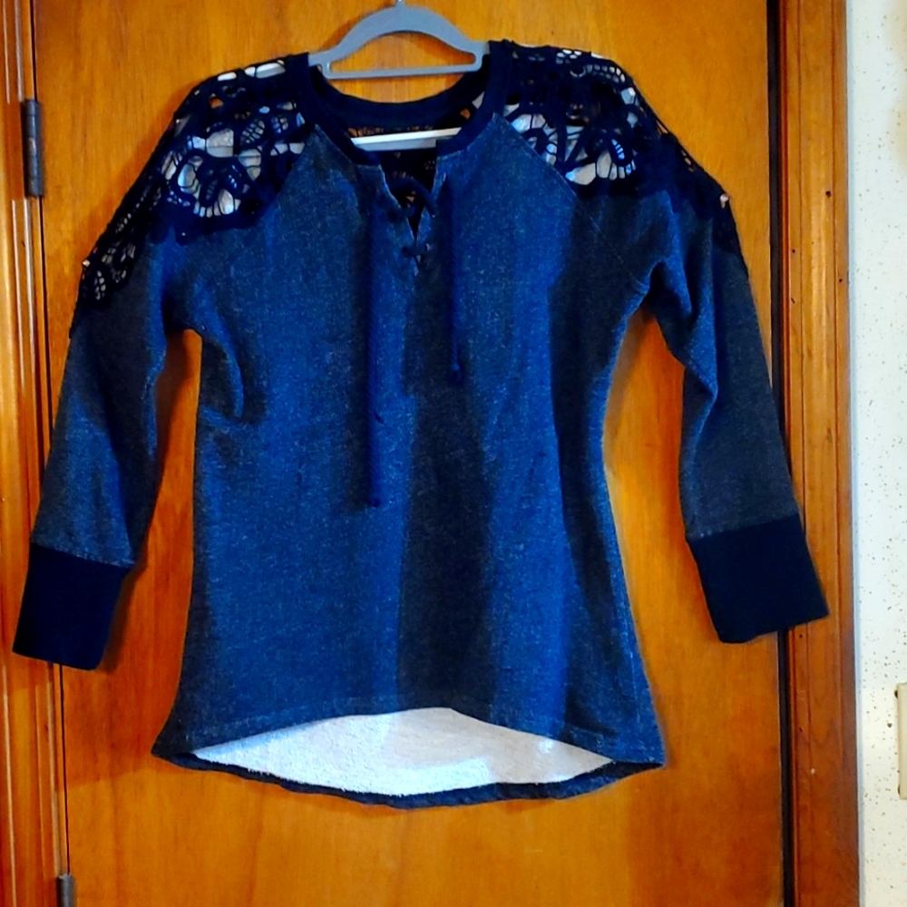 Maurices black sweatshirt with lace sleeves and back.